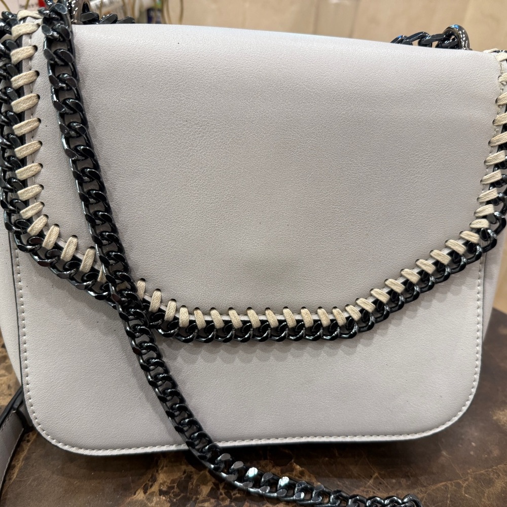 Inzi bag  pearl grey  brushed black chair detail Women Bag